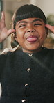 Face, child and tongue out in home with humor, playful personality and silly expression in living room. Girl, young kid and funny in house with goofy mood, childhood game and hand gesture for joke.
