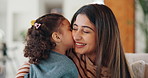 Kiss, cheek and mom with child on sofa with affection, bonding and loving relationship in home. Family, happy and mother with girl embrace for connection, love and trust for parenting in living room
