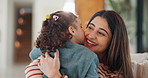 Kiss, cheek and mom with child in home with affection, bonding and loving relationship together. Family, happy and mother with girl embrace for connection, love and trust for parenting in living room