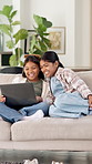 Laptop, sisters and kids relax in home for streaming movies, cartoon and laugh together on sofa. Computer, smile and children in house to watch show, funny game and girls with online entertainment