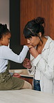 Kiss, hands and mother with child in kitchen for bonding, love and support together in home. Happy, calm and mom with girl kid on counter for connection, safety or care on weekend in apartment.