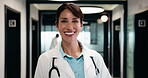 Face, doctor and woman with confidence in hospital, professional and about us for healthcare career. Portrait, happy and mature physician with tablet for medical research, wellness support and pride
