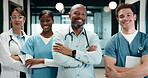 Healthcare, face and doctors with arms crossed in hospital, group and confident with medical career. Team, laugh and happy people with pride for health services, wellness and colleagues in clinic