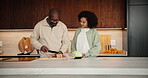 Teaching, father or girl in kitchen for meal prep, cutting ingredients or culinary skills development. Learn, smile or African man with child for bonding, healthy food or nutrition knowledge in home