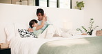 High five, tablet and happy with mom and daughter in bed for support, learning game and bonding. Success, education app and motivation with woman and child in bedroom of family home for online course