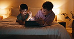 Siblings, tablet and games in bedroom for night bonding, fun and high five for development. Success, support and children relax with digital app for interaction, scroll and family connection in home