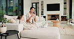 Sick, phone call and mother with daughter on sofa for influenza, telehealth advice and monitor temperature. Illness, virtual doctor and contact with woman and child in living room of family home