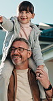 Playing, smile and dad with child in backyard for bonding, loving relationship and connection in new home. Family, parenting and father with girl for trust, pointing and view outdoor on shoulder