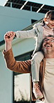 Flying, smile and dad with child in backyard for bonding, loving relationship and connection in new home. Family, parenting and father with girl for trust, fun game and view outdoor on shoulder