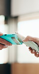 Hands, NFC and payment with phone of customer in coffee shop for hospitality or service. Contactless, digital and pos with person paying waiter in cafe or restaurant for bill, invoice or transaction