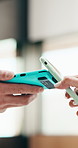 Hands, phone payment and pos with customer in coffee shop for hospitality or service. Contactless, digital and nfc with person paying waiter in cafe or restaurant for bill, invoice or transaction