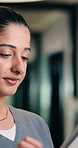 Woman, tablet and nurse with medical planning, typing or reading of records, schedule or admin. Healthcare, tech and person with smile for online results, telehealth or digital app in clinic hallway