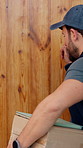 Box, delivery and front door with courier man outdoor for ecommerce or logistics shipment. Entrance, knock and package with person at home for distribution, online shopping or supply chain shipping