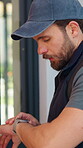 Logistics, home delivery and man with watch, outdoor and checking schedule for distribution deadline. Shipping, courier and tracking time with tech, ecommerce and person with order or supply chain