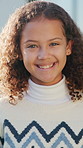 Girl, kid and face in backyard with happiness, outdoor or sunshine for wellness or holiday. Child, portrait and smile in for weekend, childhood or break at home with comfort, security or vacation
