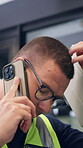 Phone call, ppe or contractor in office with issue, delivery delay or material shortage in supplier update. Frustration, man or engineer with tech, client complaint or vendor error in workplace.
