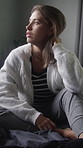 Stress, thinking and woman with depression on bed in apartment for fail, mistake or regret. Anxiety, loss and reflection with sad person in bedroom of home for emotional trauma, ptsd or worry