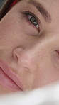 Relax, bed and face of woman on pillow for comfortable, cozy and resting on weekend in home. Morning, happy and portrait of person in bedroom, blink and wake up for calm, peaceful and wellness