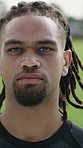 Face, rugby and man outdoor for sports, game training and confidence with determination for wellness. Portrait, proud player and serious person on pitch, professional athlete and exercise for fitness