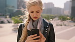 Student, woman and travel in city with phone, reading college email and vigilant of surroundings. Person, typing or careful in urban town with tech, text message notification or commute to university