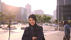 Face, college student and Muslim woman in city with confidence, future development or smile with wind. Portrait, hijab and Islamic person outdoor for education, arms crossed or academic opportunity