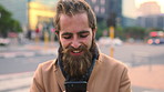 Commute, laugh or businessman in city with phone, online communication or comic post on social media. Happy, wind or employee in town with tech, funny text message or meme reaction in travel routine.