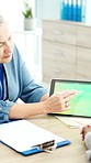 Tablet, discussion and doctor in office at hospital with research for medical diagnosis or treatment. Digital technology, woman and mature healthcare worker with conversation in checkup at clinic.