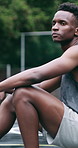 Thinking, basketball and black man with fitness, outdoor and break for rest, wellness and exercise. Player, healthy person and athlete with strategy for games, competition and contemplation for goals