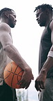 Sports, basketball and scuffle with men on court for competition, game tournament and contest. Fitness, training and defense guard with low angle of people outdoor for athlete and match skills