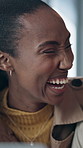 Laptop, laughing and talking with black woman in coffee shop for reaction to article, blog or news. Computer, conversation and funny with happy customer in cafe or restaurant for chatting and humor