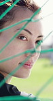 Fitness, thinking and woman by net on field, training break and planning for sports practice routine. Game reflection, rest and goalkeeper with idea for defense, technique visualization and daydream