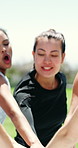 Fitness, women and huddle with hands stack for support, collaboration or solidarity outdoor with coach. Team, people and community together for motivation, exercise goal and synergy for sport