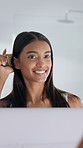 Beauty, hairbrush and mirror with happy woman in home bathroom for morning routine. Grooming, haircare and reflection with person in apartment for benefits of conditioner or shampoo treatment