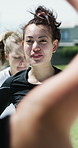 Rugby, talking and warm up routine with women outdoor for game preparation or strategy. Coaching, instructions and stretching with sports team on field for competition, getting ready or match