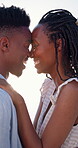 Couple, hug and laugh on holiday, romance and travel with partner on date or anniversary celebration. Outdoor, black people and embrace with spouse on special event, bonding and support on vacation