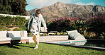 Soccer, ball and child in backyard by home for practice, exercise or sports game development. Skill, football and boy kid outdoor training, workout or match energy by house for active on weekend.