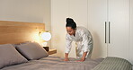 Change, morning and woman making bed in home for daily routine, fresh fabric or maintenance. Cleaning, neat and tidy with person in bedroom of apartment for chores, housework or responsibility