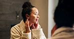 Happy, woman and skincare in bathroom with mirror, morning routine and satisfaction for grooming. Female person, reflection and skin evaluation in home with smile, dermatology results and self care.