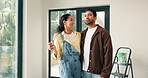Couple, smile and planning for home renovation, talking and ideas for diy interior design in lounge. Happy people, discussion and brainstorming for decoration, relocation and creative in new house