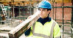 Man, architect or walking with concrete for building material or foundation on construction site. Male person, contractor or civil engineer with equipment for structure or architecture development