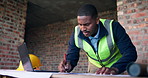 Black man, laptop and drawing on construction site for blueprint, inspection or update planning. Infrastructure, quality control and engineer with tech, report or project management for renovation