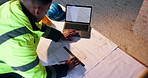Man, architect or writing with blueprint or laptop for construction planning or building design. Top view, male person or contractor with floor layout for civil engineering or architecture project