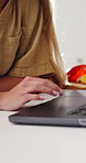 Hands, woman and laptop at house for cooking, research and online recipe for healthy food. Couple, scroll and pc in home with vegetables, streaming tutorial and meal prep instructions for vegan lunch