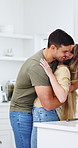Couple, hug and kiss in kitchen with love for cooking, support and bonding together with meal prep. Man, woman and happy in home with conversation for lunch, smile and commitment in healthy marriage
