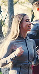 Happy, couple and running in forest with fitness, healthy relationship or cardio workout for wellness. Married people, smile and runner in nature with outdoor exercise, endurance training or movement