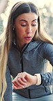 Woman, runner and smart watch in nature with break, heart rate tracker and fitness app notification. Bokeh, person and cardio training outdoor with wearable tech, monitor running pace and wellness.