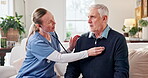 Stethoscope, consulting and nurse with old man on sofa for heart arrhythmia, retirement and support. Tachycardia exam, help and medical advice with elderly person and caregiver in home for wellness