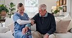 Consultation, blood pressure and nurse with senior man for homecare with hypertension diagnosis. Sphygmomanometer, medical checkup and caregiver with elderly patient for cardiology exam in house.