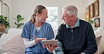 Senior man, laughing and caregiver with tablet in nursing home, conversation and good news in lounge. Retirement, healthcare and nurse with tech for treatment plan, happy and talk with elderly person