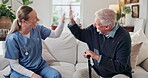 High five, happy and nurse with old man on sofa for connection, retirement or support. Healthcare, bonding and medical advice with senior person and caregiver in home for wellness and elderly care